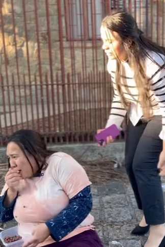 H0110001_Moradora de rua maltr_part2.mp4